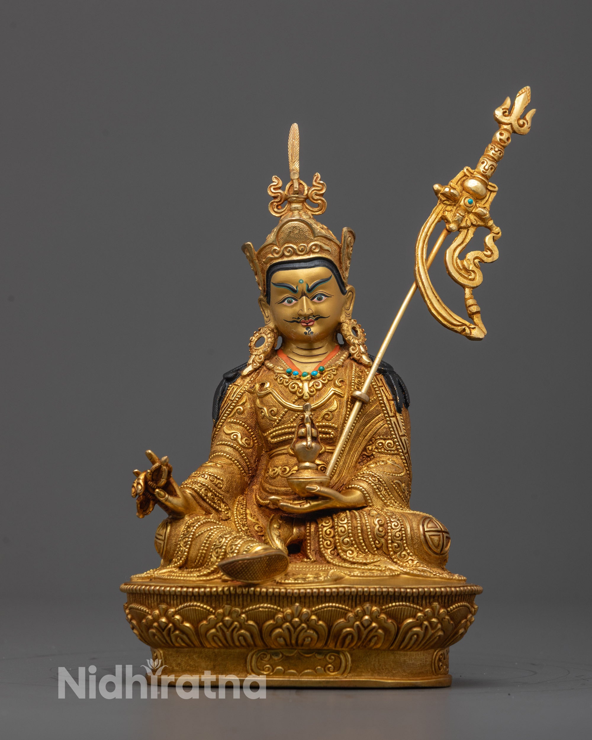 Full image of Hand-carved Guru Rinpoche statue seated on lotus with 24K fire gold gilded finish