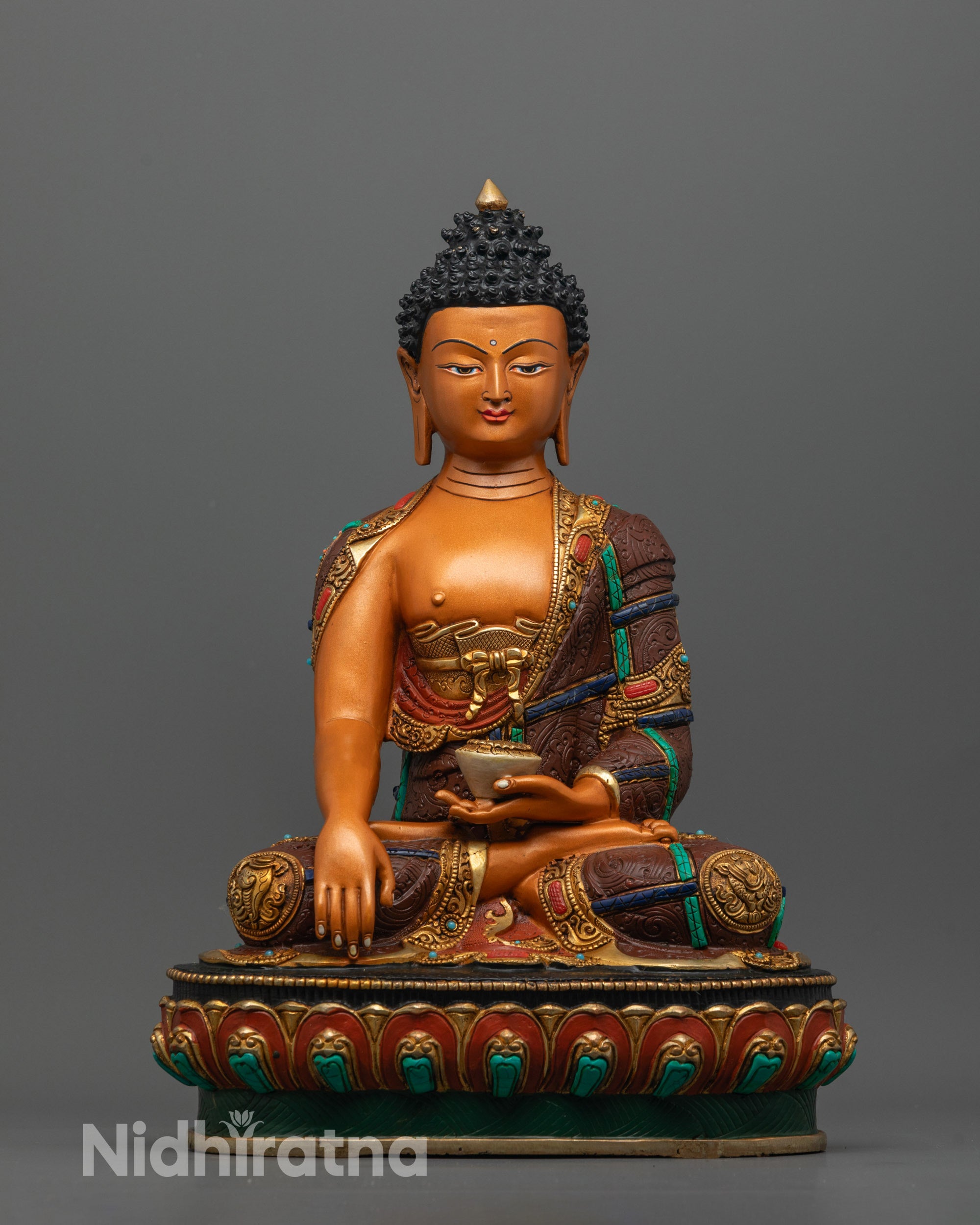 Full image of Hand-carved Shakyamuni Buddha Statue in orange acrylic color