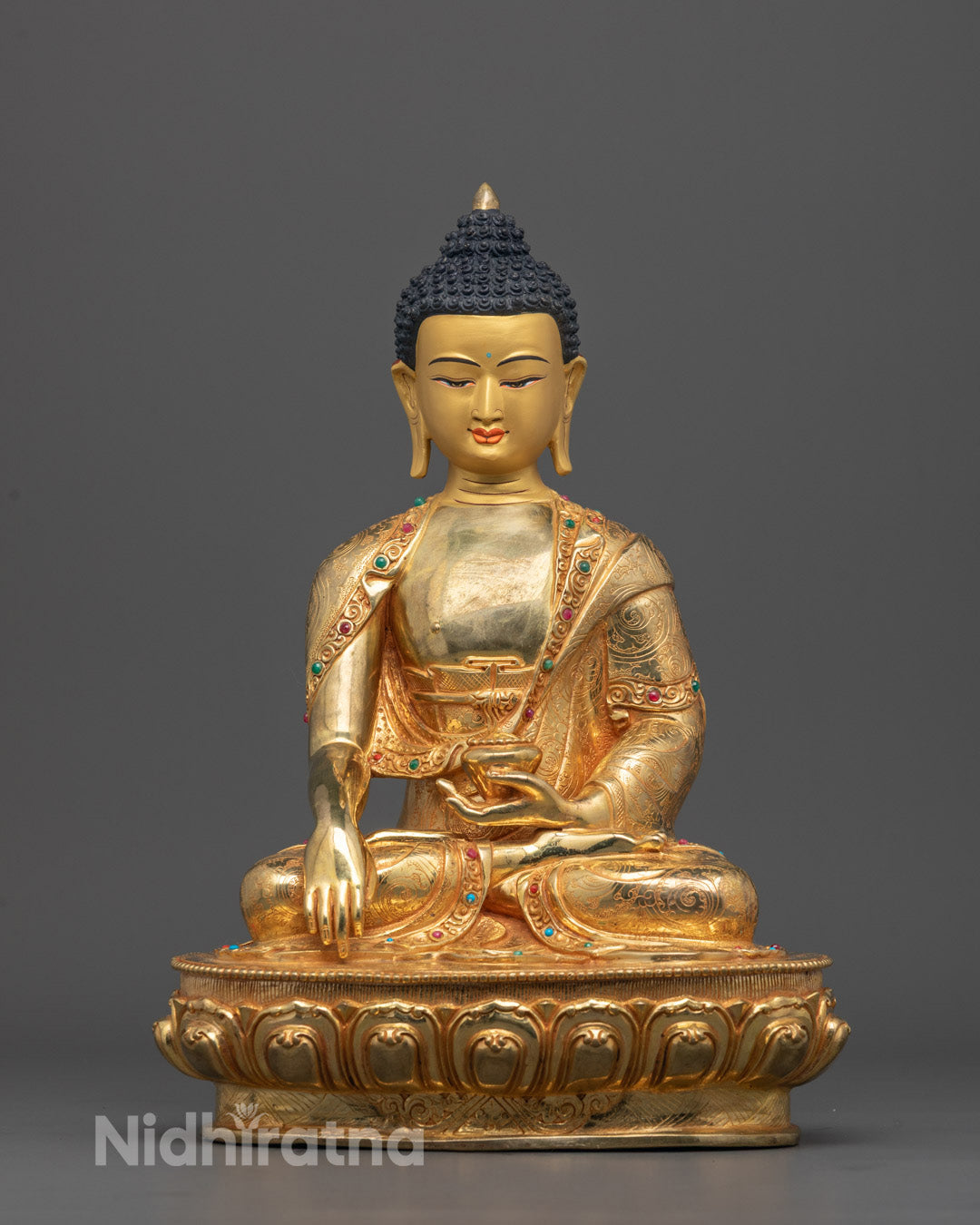 Full image of Hand-carved Shakyamuni Buddha statue seated on lotus base