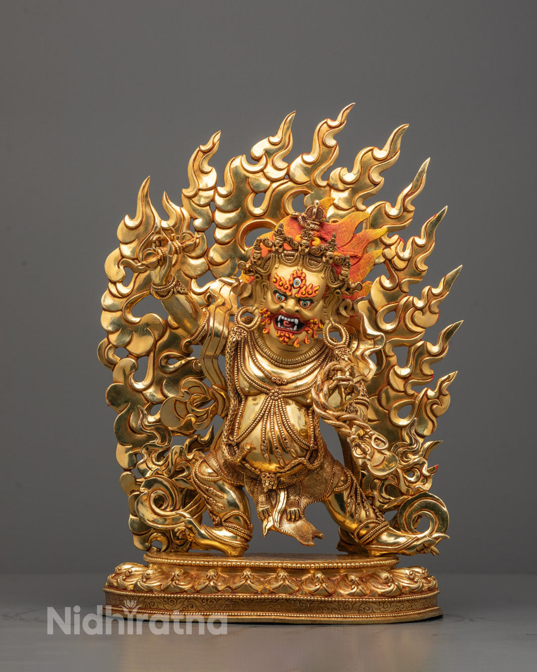 Vajrapani Statue standing on lotus base with vajra in hand