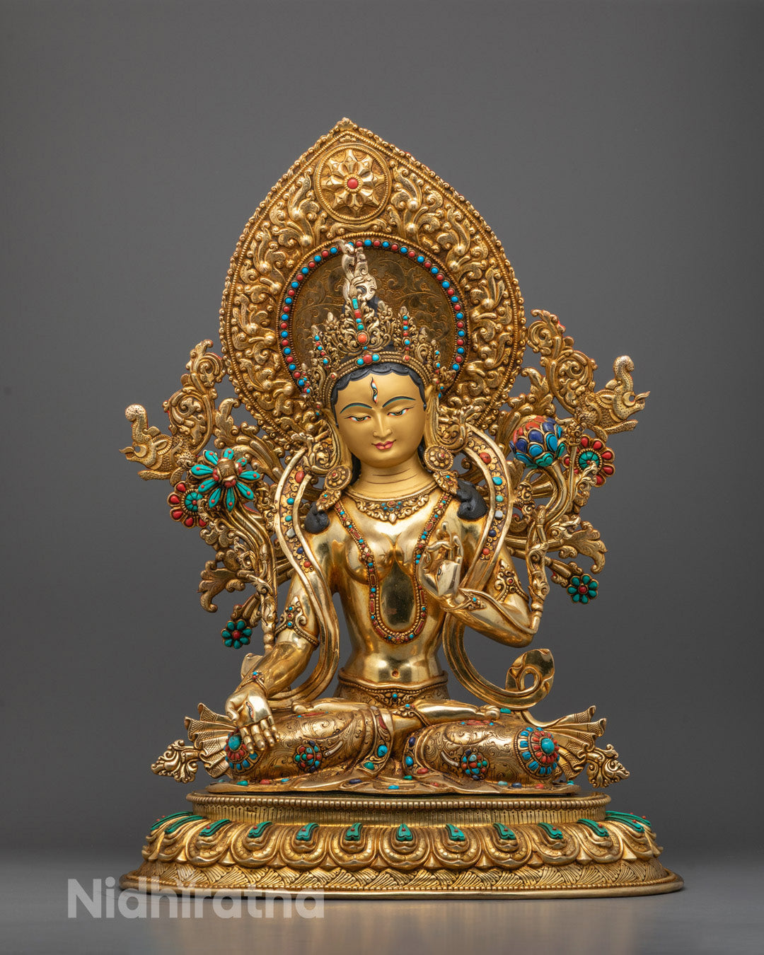 Full image of Hand-carved White Tara Statue seated on lotus base with seven eyes 