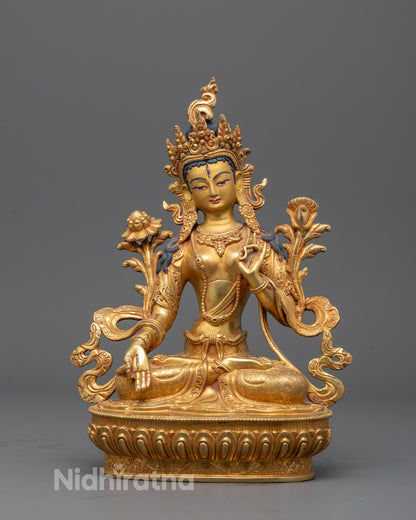 Full image of Hand-carved White Tara statue seated in lotus posture with seven eyes