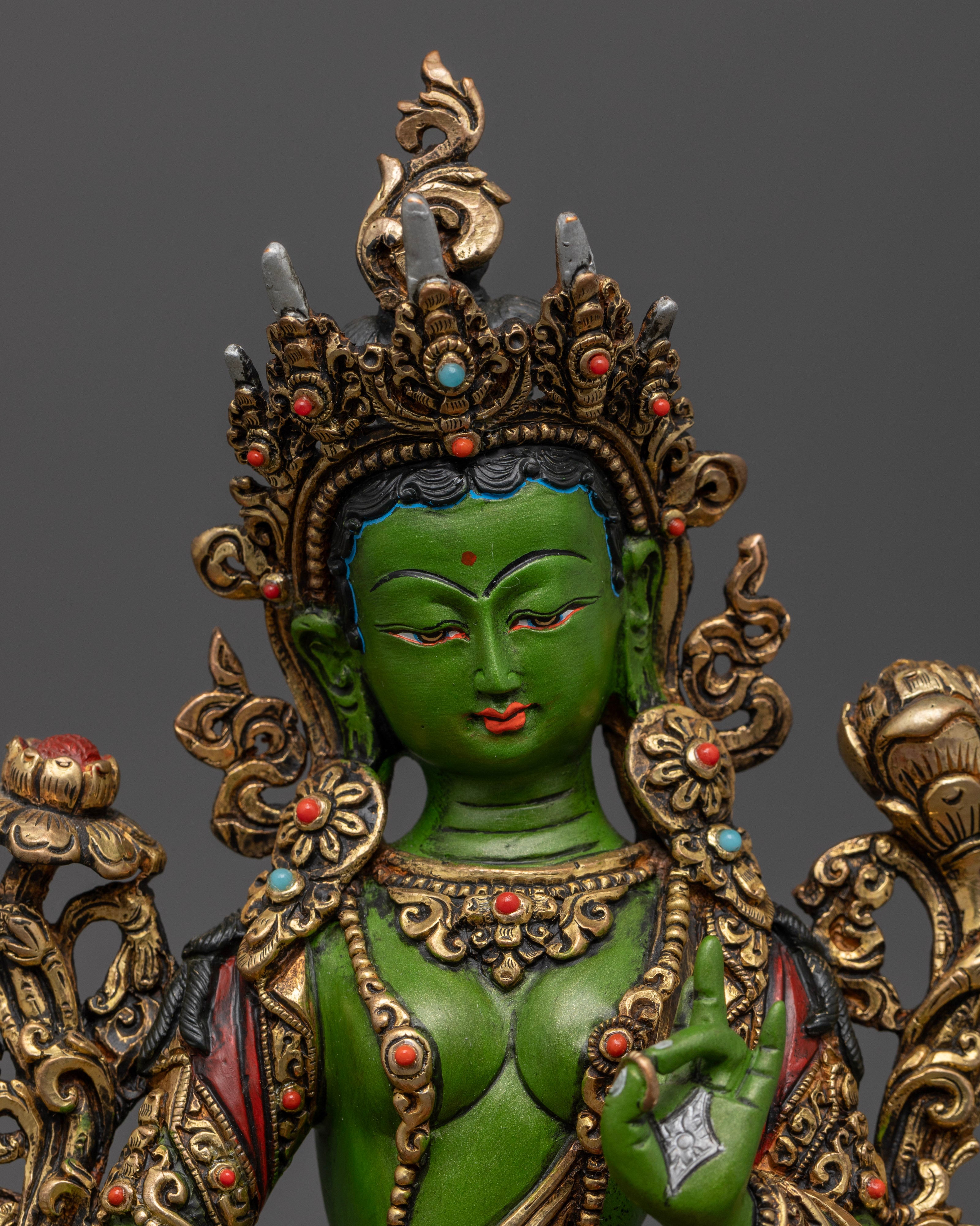 It shows portrait view of Green Tara Statue 