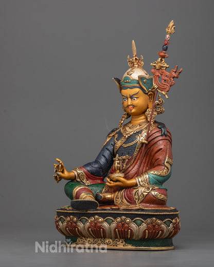 Guru Rinpoche statue seated in meditation posture