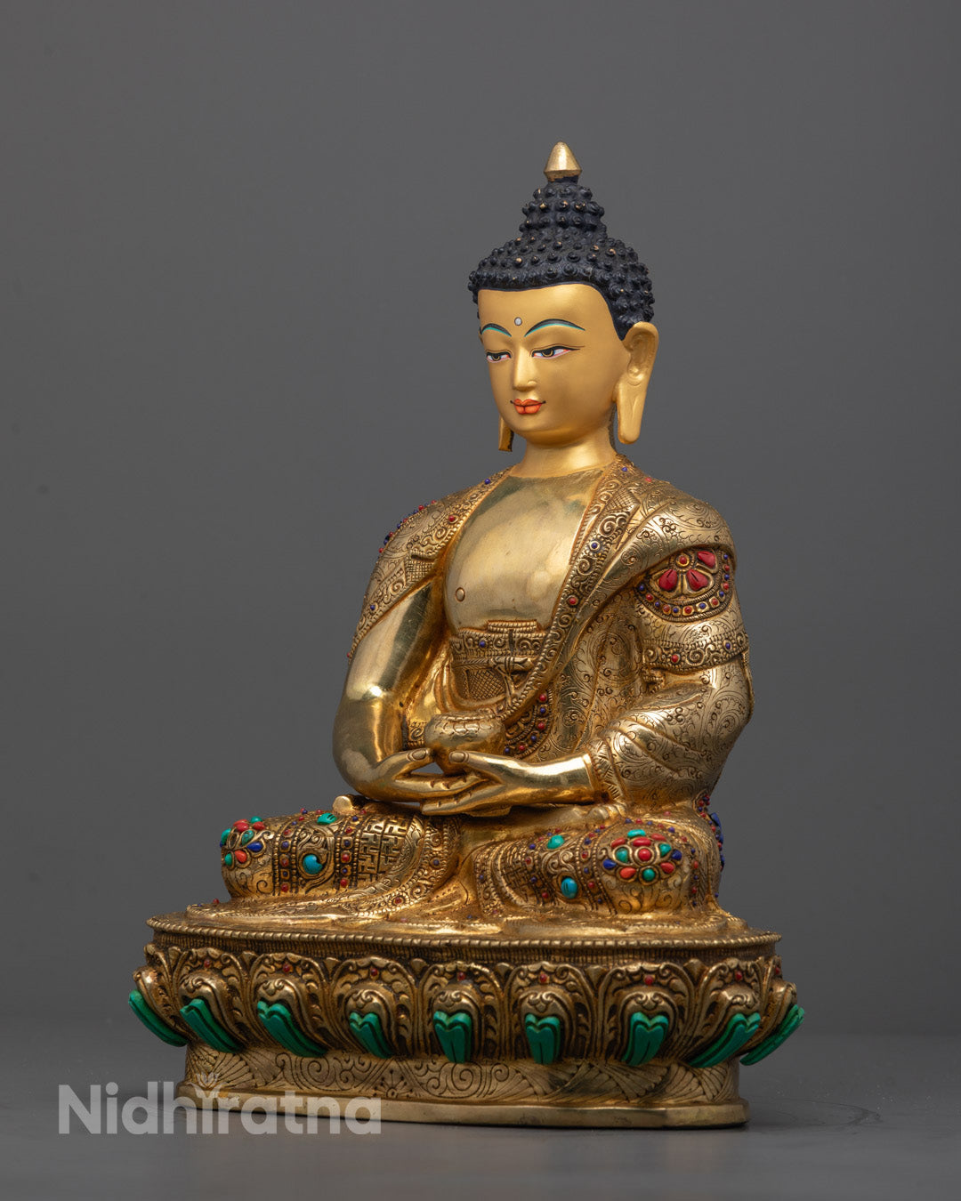 Full view of Amitabha Buddha statue with symbolic Varada mudra hand gesture