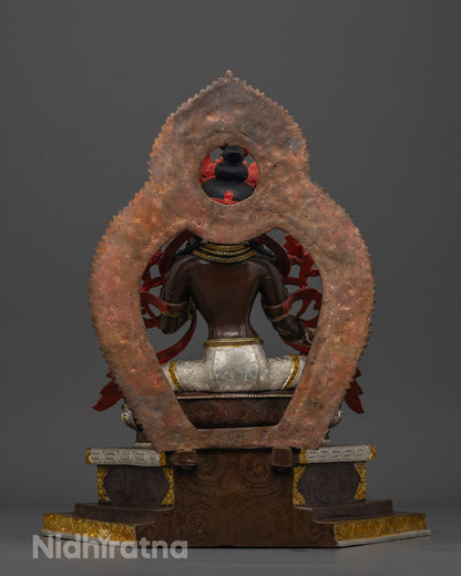 Full view of Green Tara statue crafted from oxidized copper