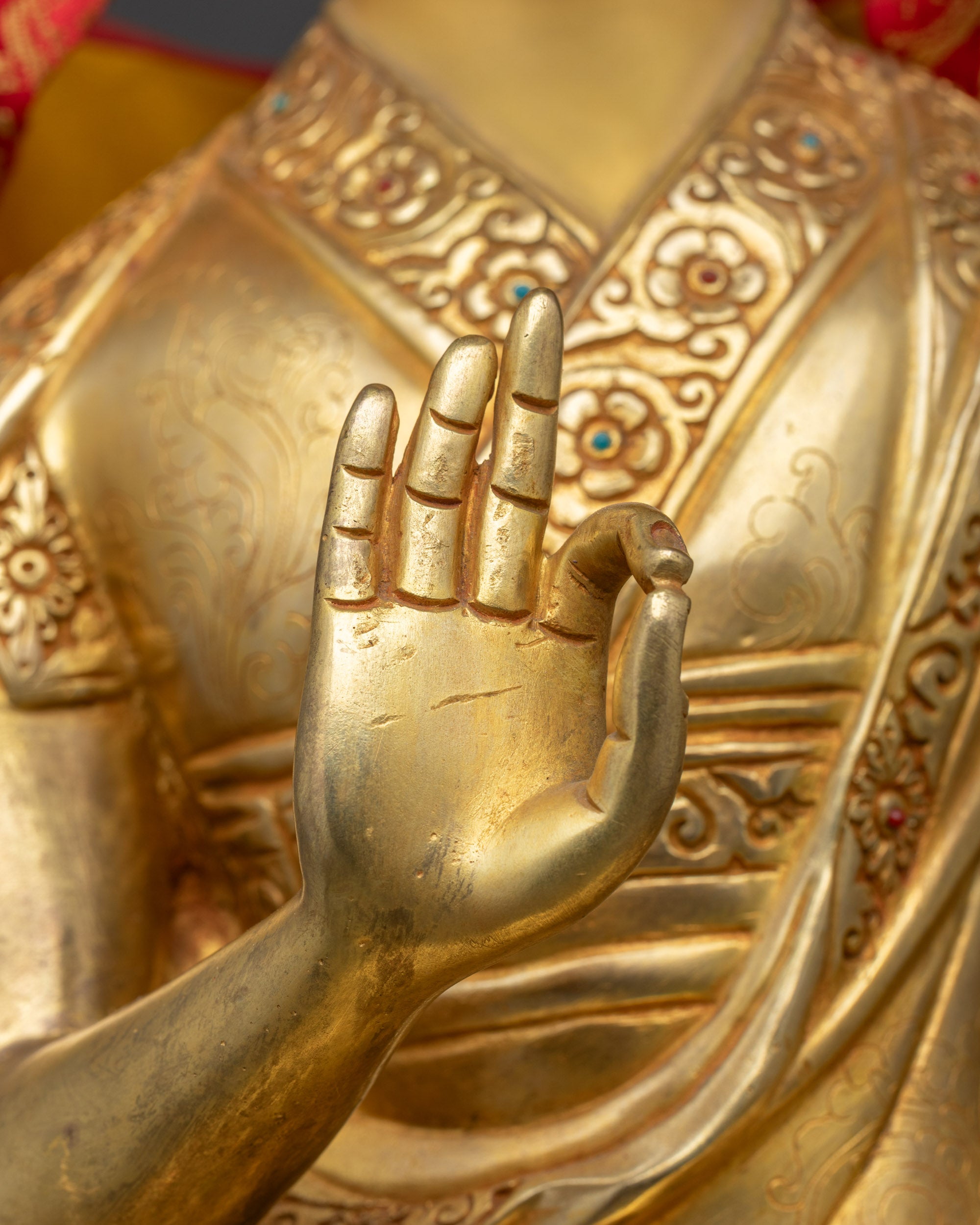 Full view of Gyaltsab Je and Khedrup Je in full monastic robes, each holding a scripture in Vitarka Mudra.