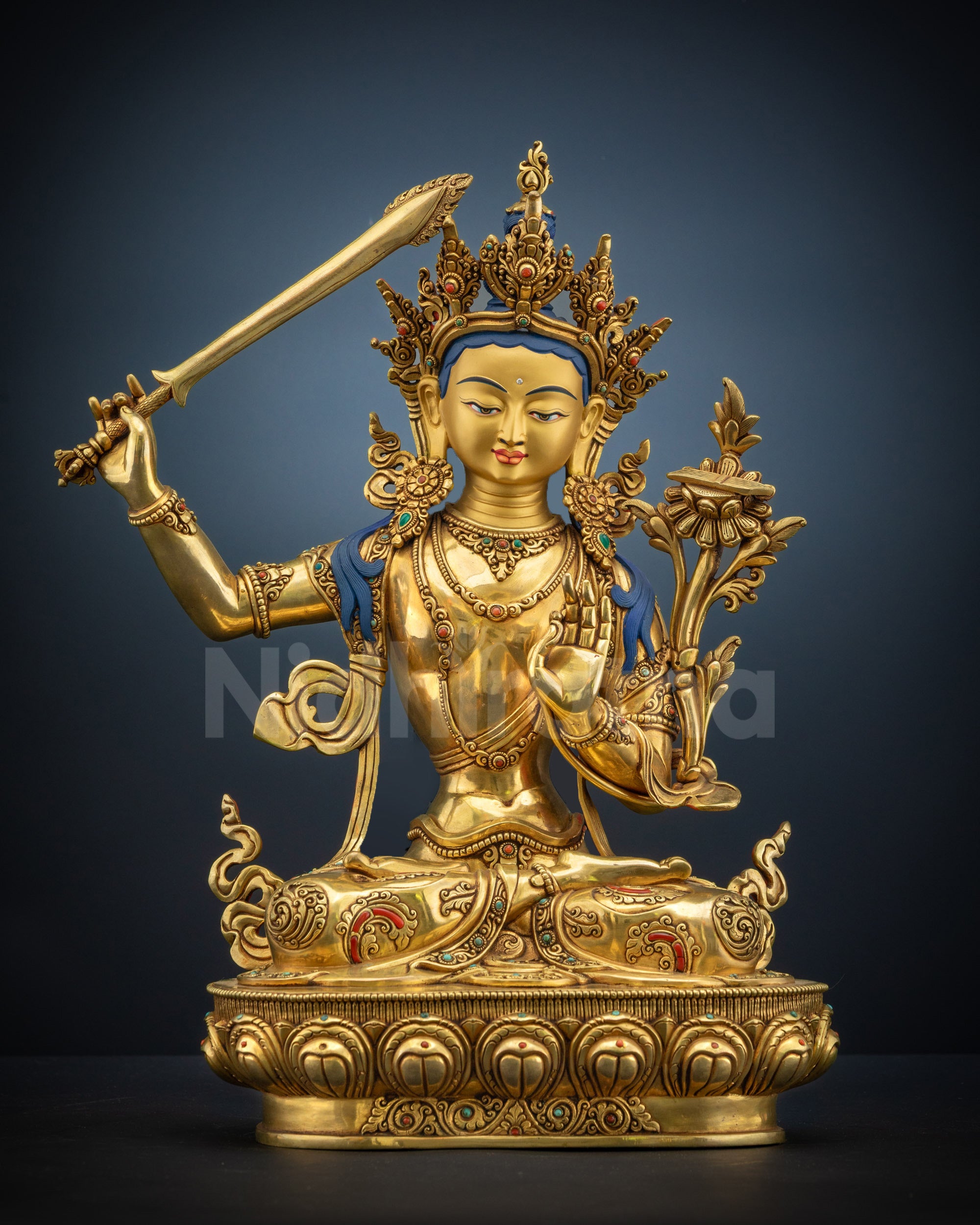 Full view of Masterpiece Manjushri Statue with gold-gilded face and flaming sword
