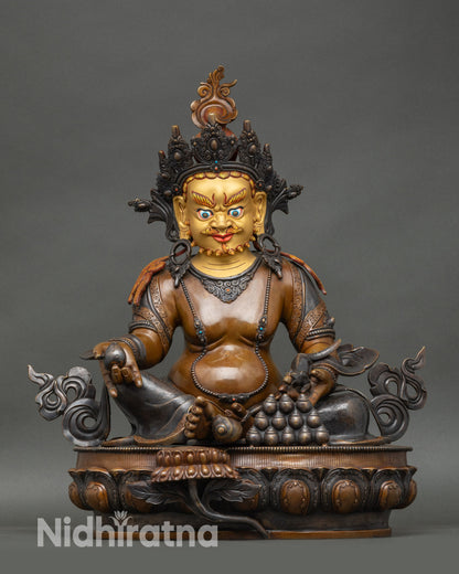 Full view of Nepalese Dzambhala Statue seated on lotus with citron fruits and jewel-spitting mongoose