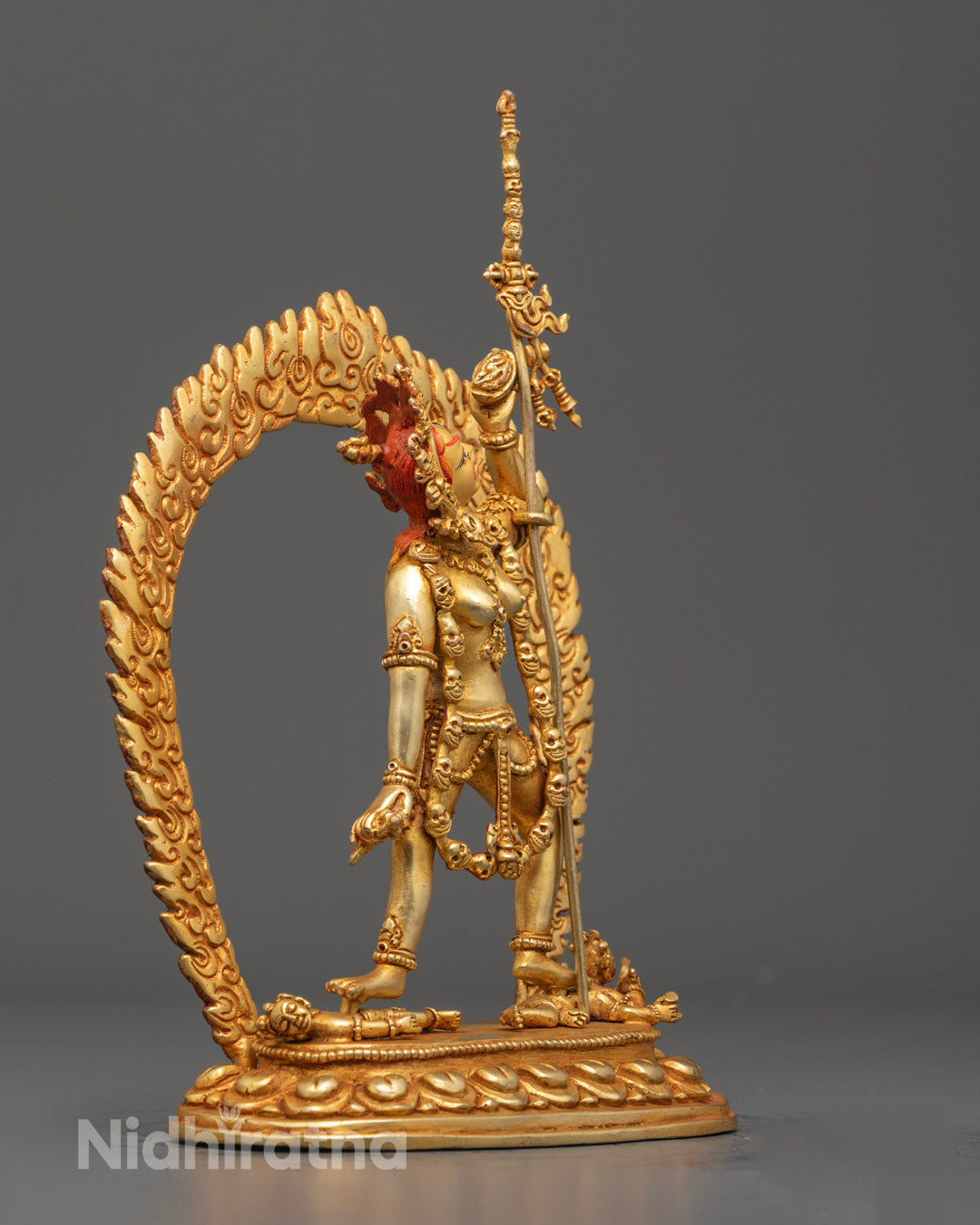 Vajrayogini sculpture in dynamic dancing pose, showcasing intricate details and traditional craftsmanship.