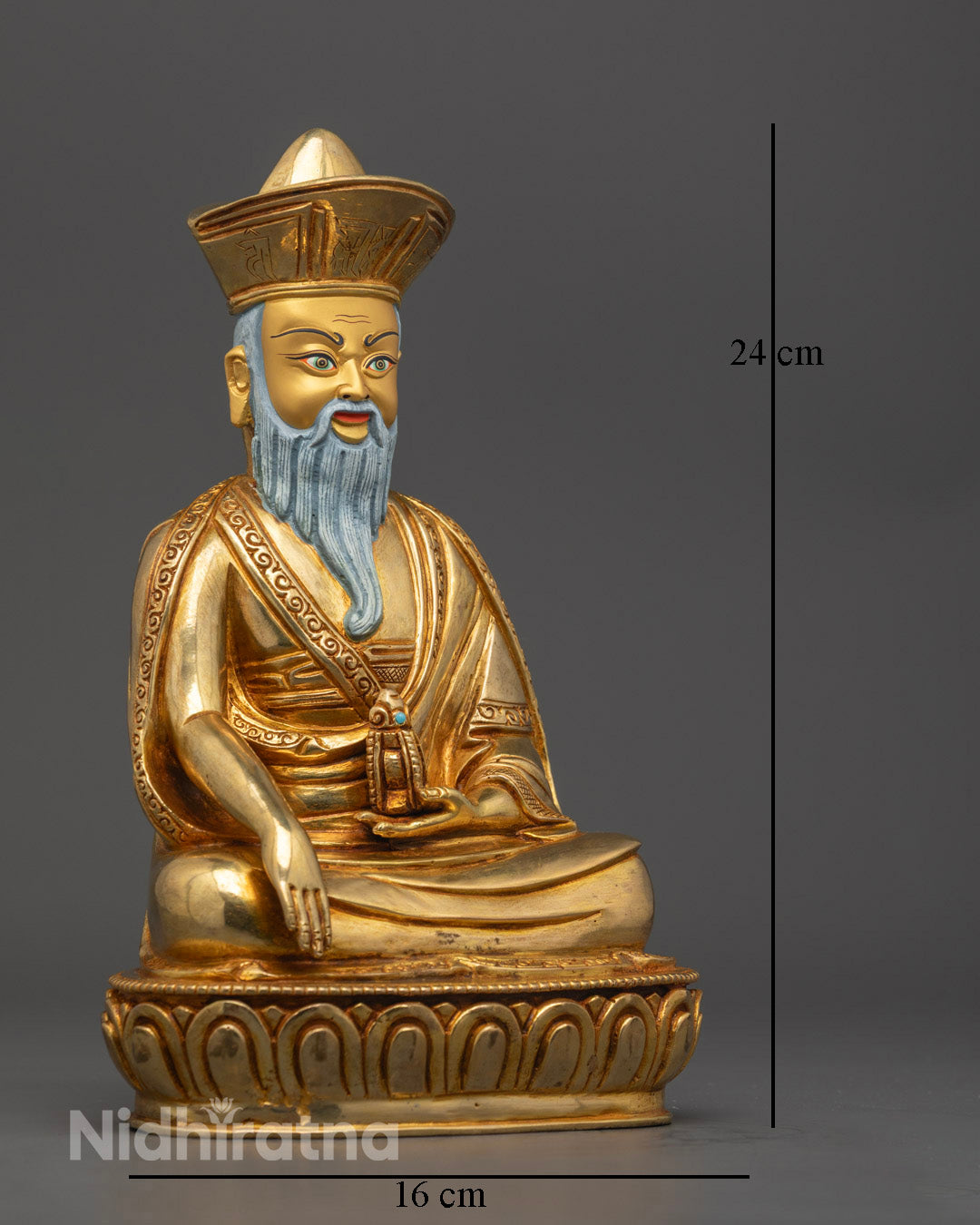 fire-backed Guru Shapdum sculpture highlighting symbolic protective adornments and ornate craftsmanship.
