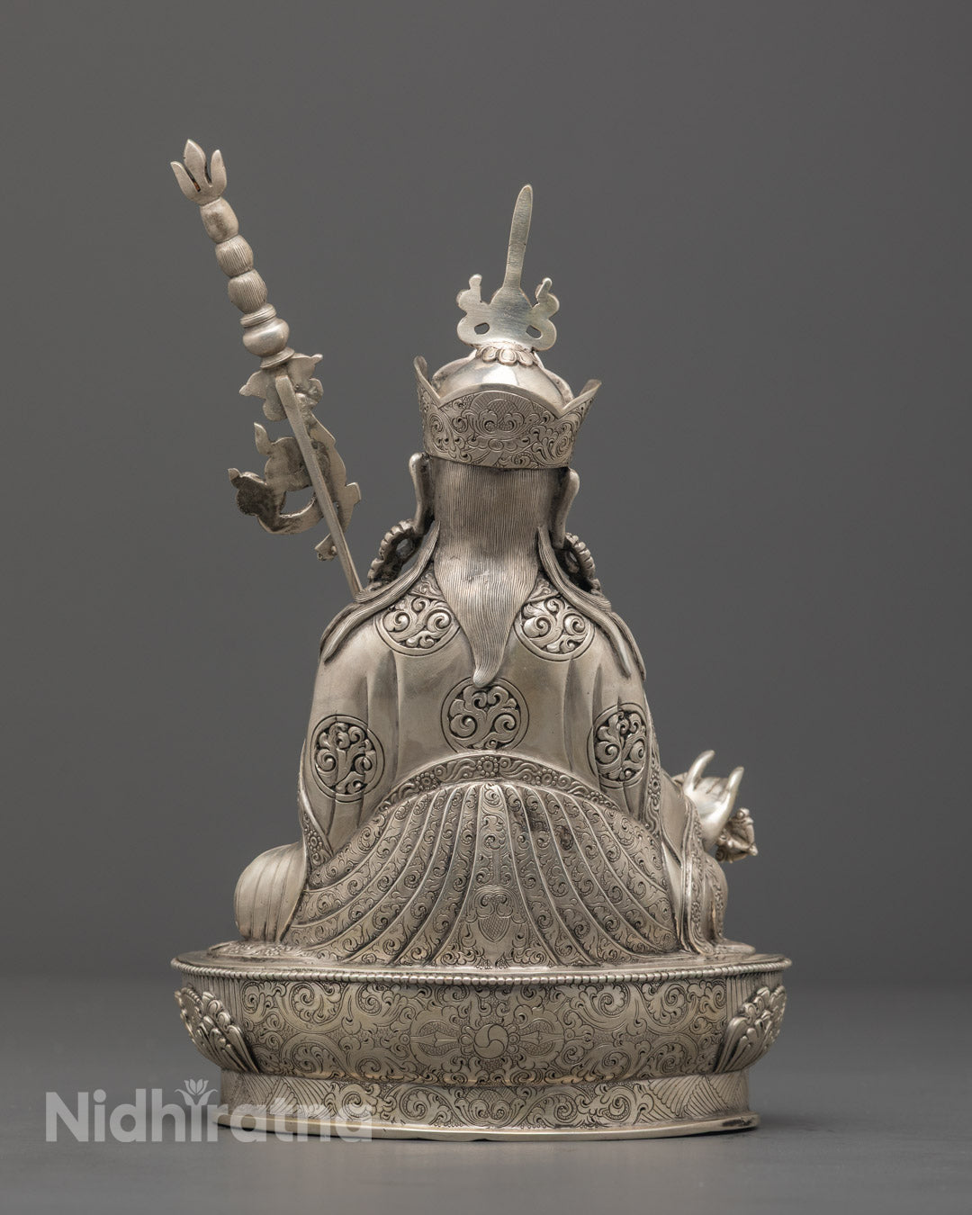 intricately detailed Guru Rinpoche statue for altar or meditation space, radiating spiritual presence and protection