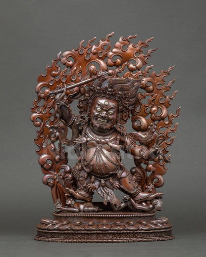 Full view of oxidized copper Hayagriva statue subduing figures on lotus throne