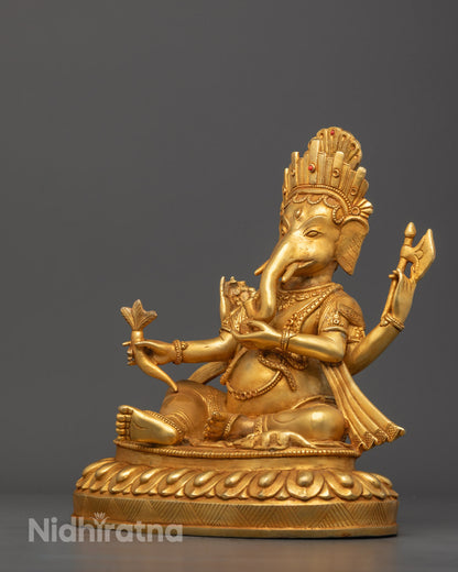 Ganesh sculpture seated on a lotus pedestal, highlighting the exquisite craftsmanship and vibrant colors from Nepal.