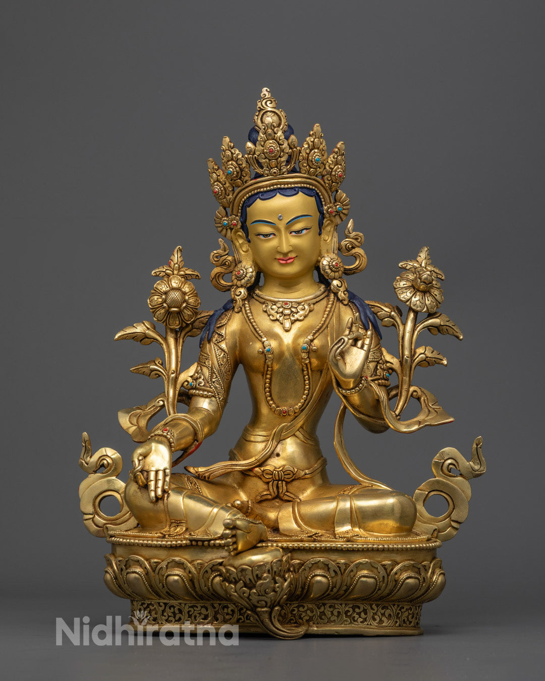 Green Tara Statue seated on a lotus throne, featuring a hollow space for filling auspicious mantras and enhancing meditation.