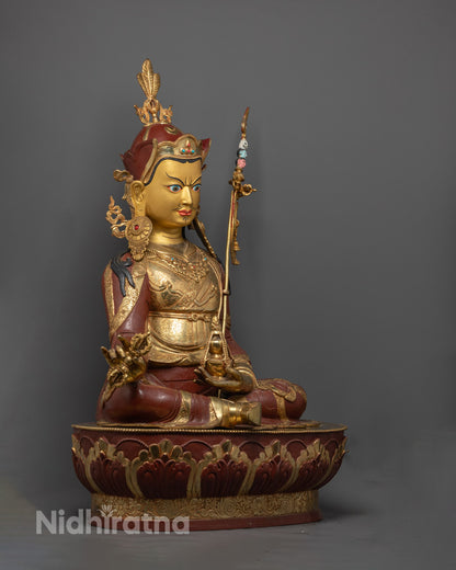 Guru Rinpoche Statue seated on a lotus throne, featuring a hollow space for filling auspicious mantras to enhance meditation.