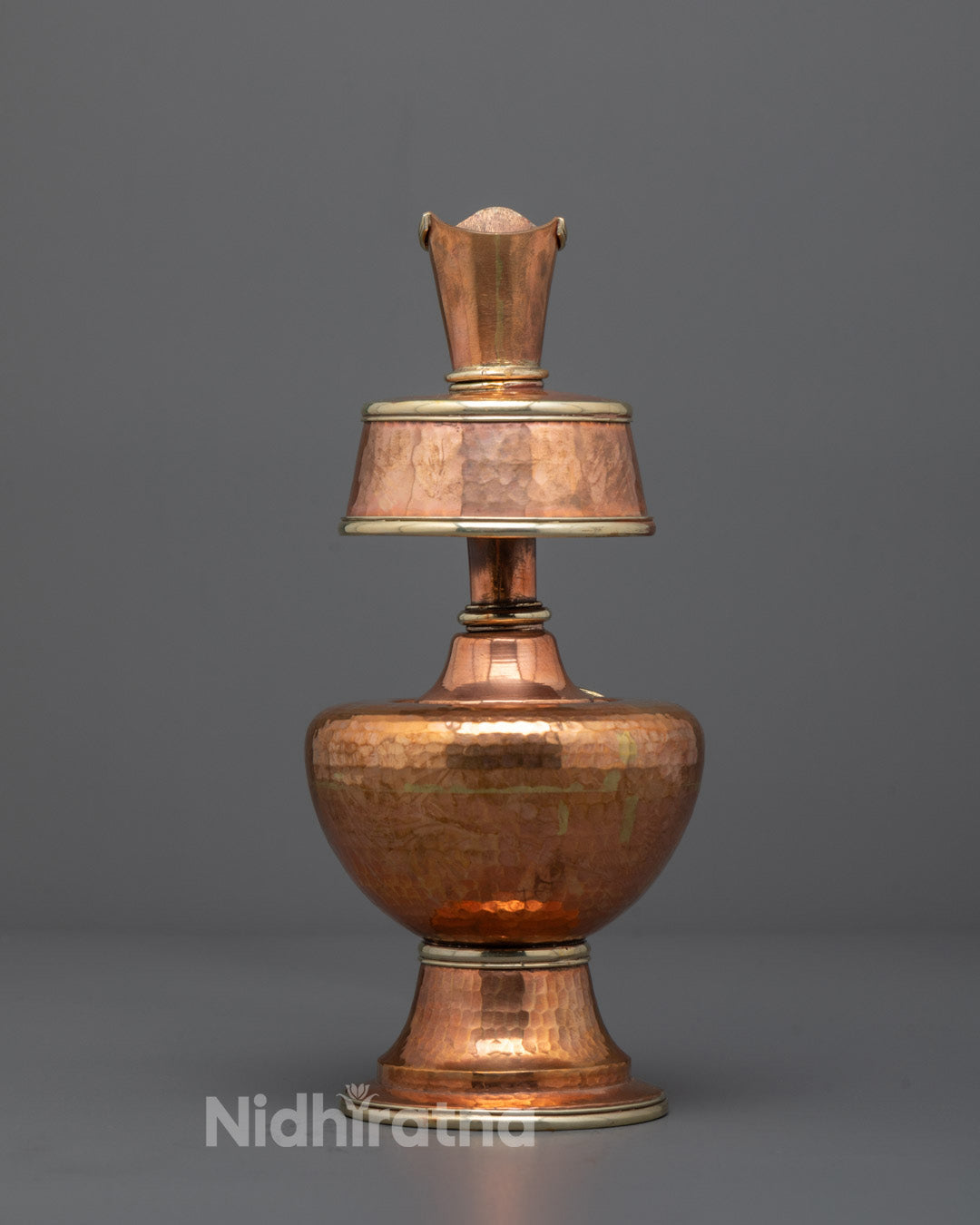 Full view of the handcrafted Chegumba placed on a decorative base