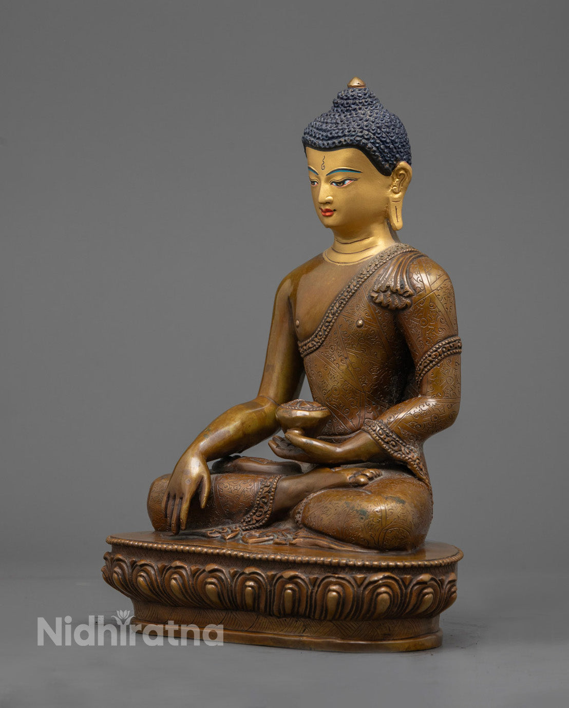 oxidized copper Shakyamuni Buddha statue with halo, seated in meditation posture, handcrafted in Nepal.