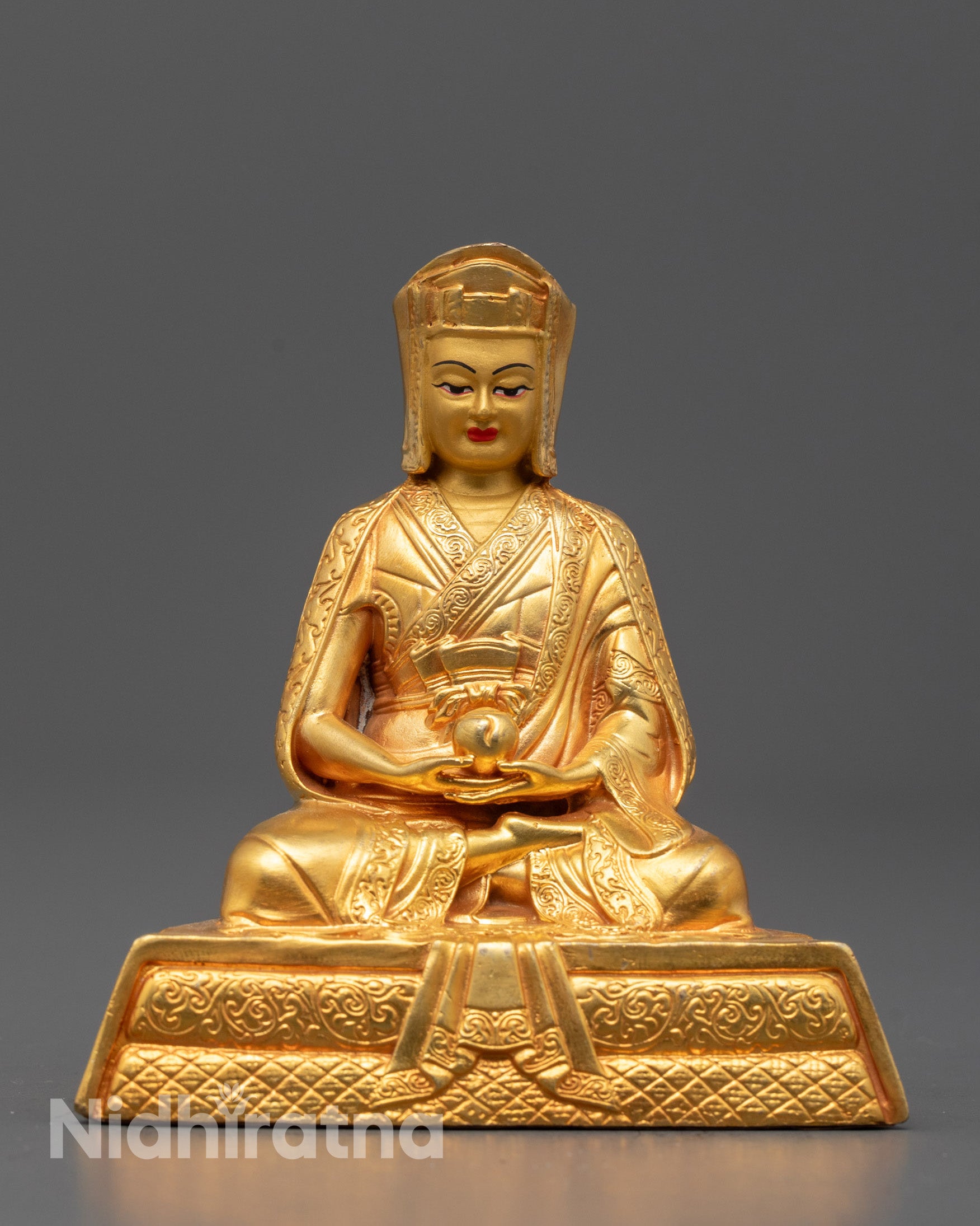 Gampopa Statue made from 24k gold plated copper seated in meditation posture