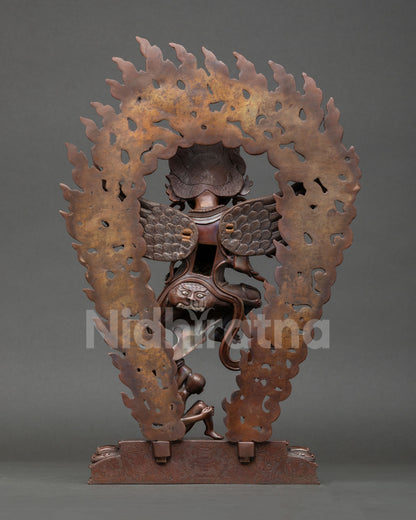 Back view of Garuda statue oxidized copper finish intricate detailing wings ornaments traditional Himalayan artisan statue
