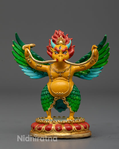 Garuda Dev figurine with copper body and gold-plated face showcasing divine strength and protection