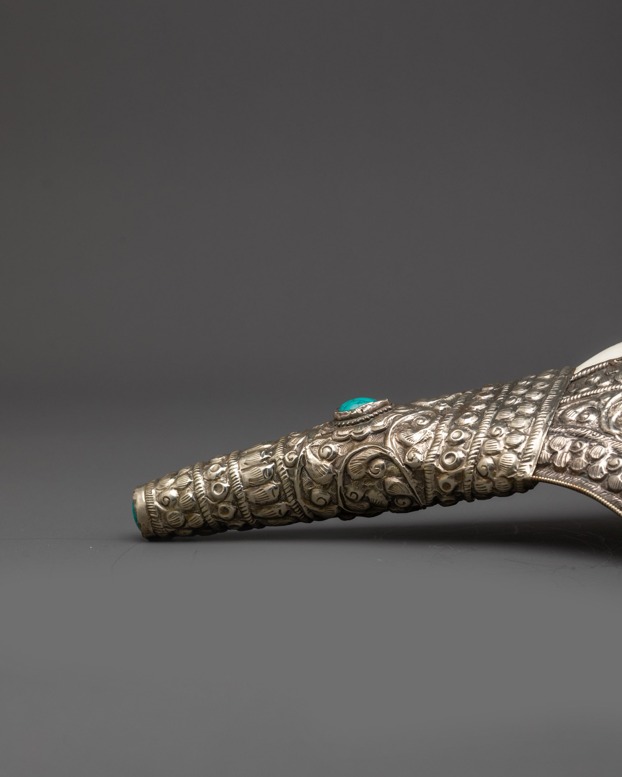 Genuine ritual Shankh featuring floral engravings and auspicious Buddhist symbols