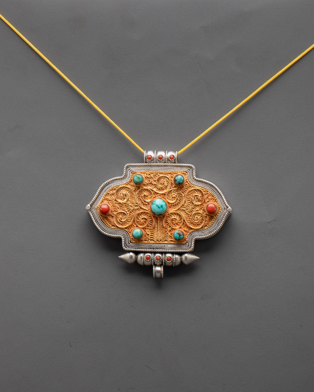 Ghau Box Locket worn as a necklace, showcasing its detailed craftsmanship