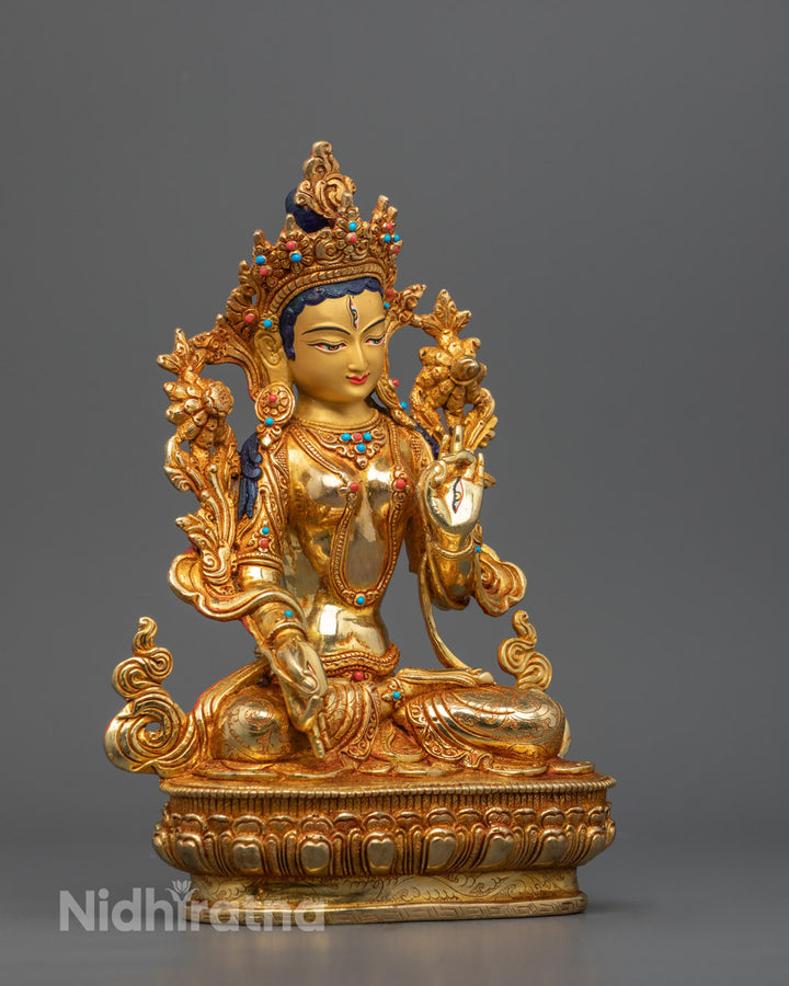 A beautifully crafted White Tara statue seated in a meditative posture, adorned with intricate details and 24K gold plating, symbolizing healing, compassion, and longevity.