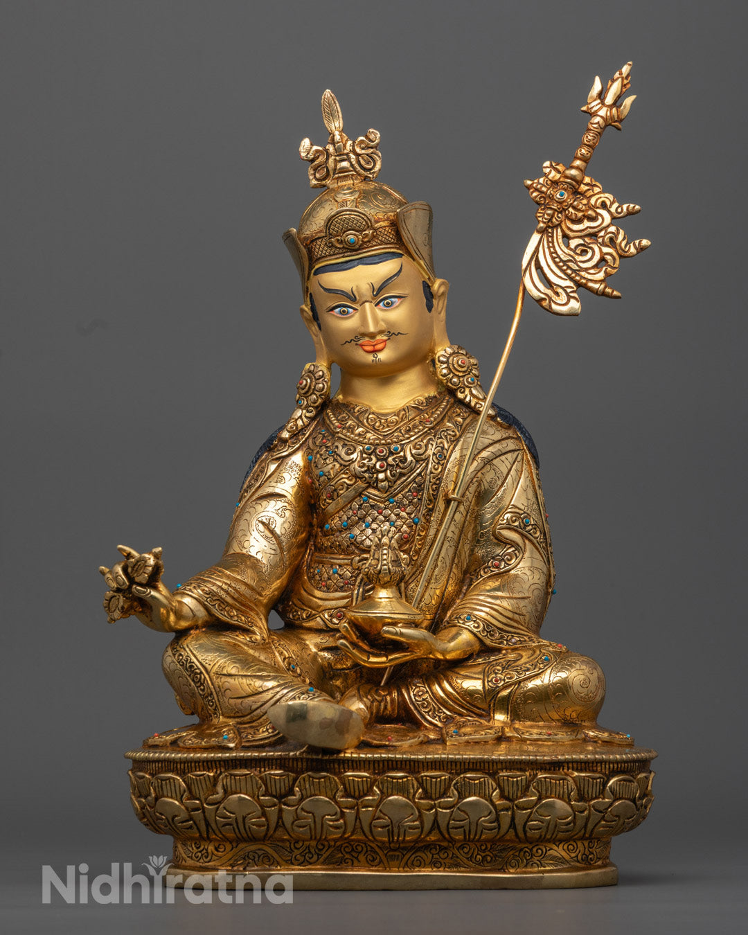 Gold-plated Guru Rinpoche statue with gold-painted face handcrafted by Nepalese artisans for meditation and home decor