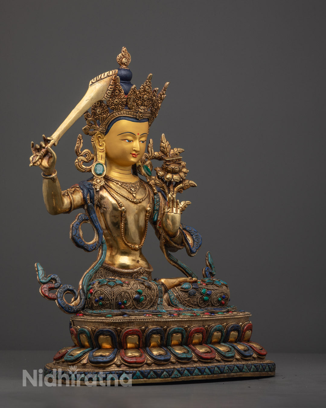 Gold fire-gilded Manjushri copper statue with detailed acrylic colors and jewelry carvings – ideal for meditation and sacred space altar setup
