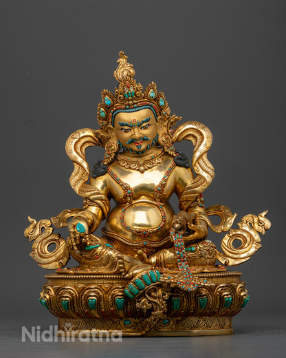 The gold plated Dzamabala statue adorned with semiprecious gemstones |  Buddhist Dzambala statue | Dzambala statue for sale