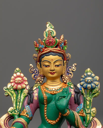 Green-Shade Mother Tara statue showing detailed carving on flowing robe and jewelry with uptala flower