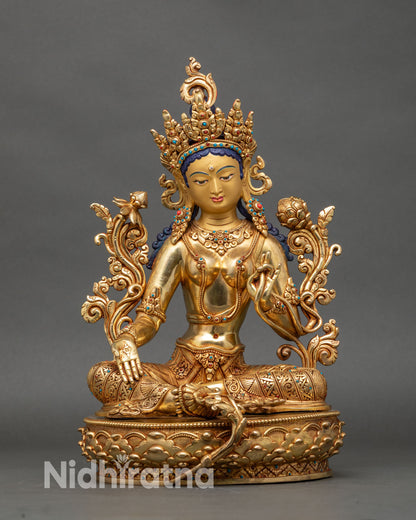 Green Tara statue on lotus pedestal, handcrafted Nepalese copper and gold