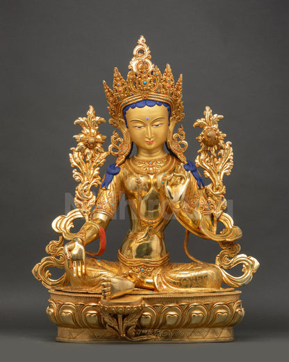 Green Tara Buddhist statue with fire gilded gold finish seated on lotus pedestal