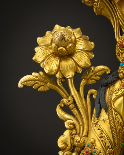 Polished Green Tara Buddhist statue from Nepal featuring intricate carvings and sacred iconography