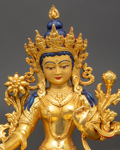 Green Tara Sculpture gold-gilded face semi-precious stones regular close up
