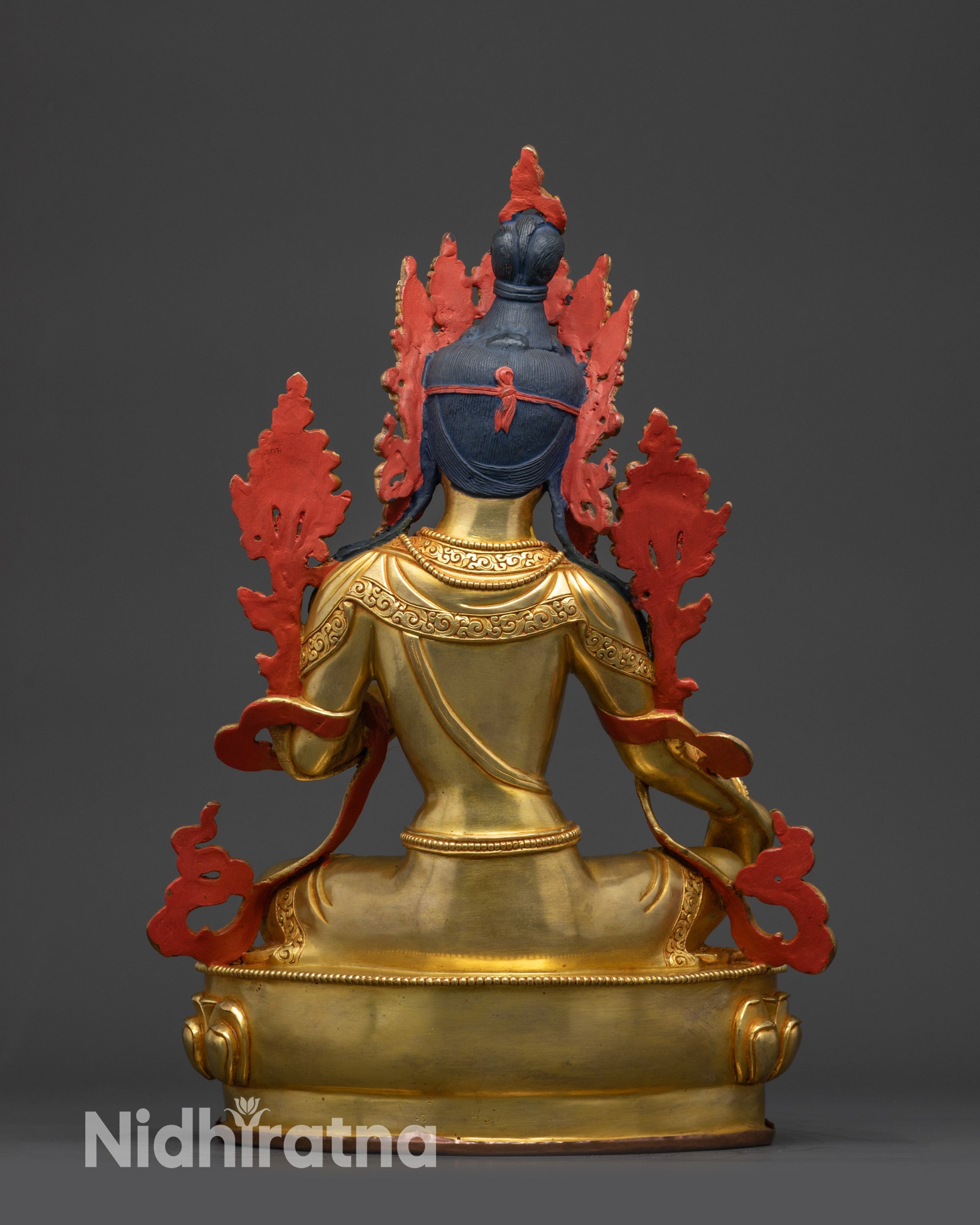 Green Tara Statue back view detailed carvings on jewelry and lotus base