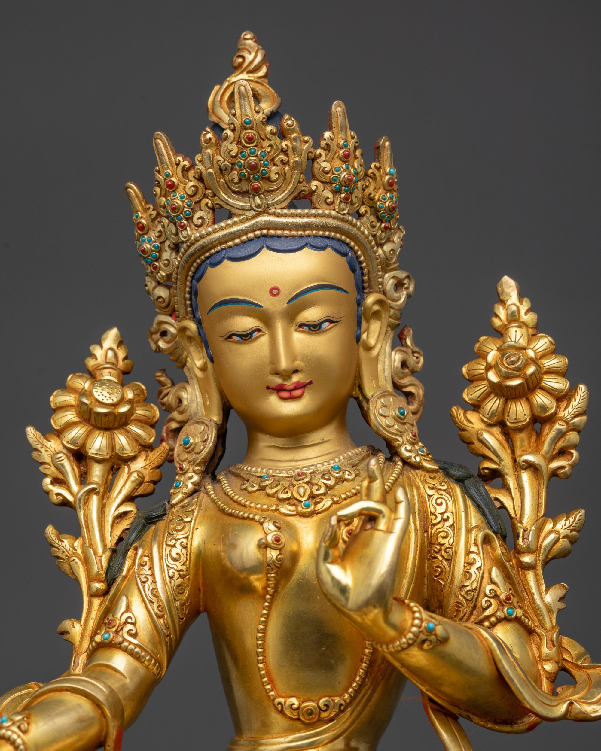 Green Tara Statue close-up showing gold fire-gilding and lotus seat details