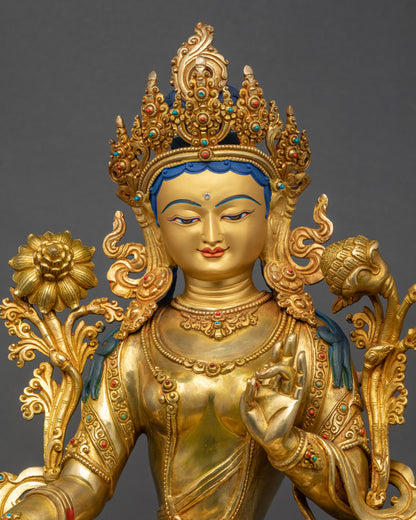 Green Tara Statue close up gold-gilded face and 3D carvings Nepalese artwork