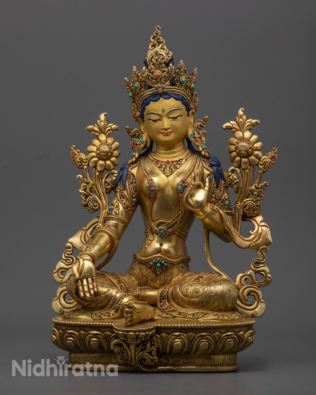 Intricately handcrafted with premium gold finish and semi-precious stones, symbolizing Tara's grace and enlightenment.