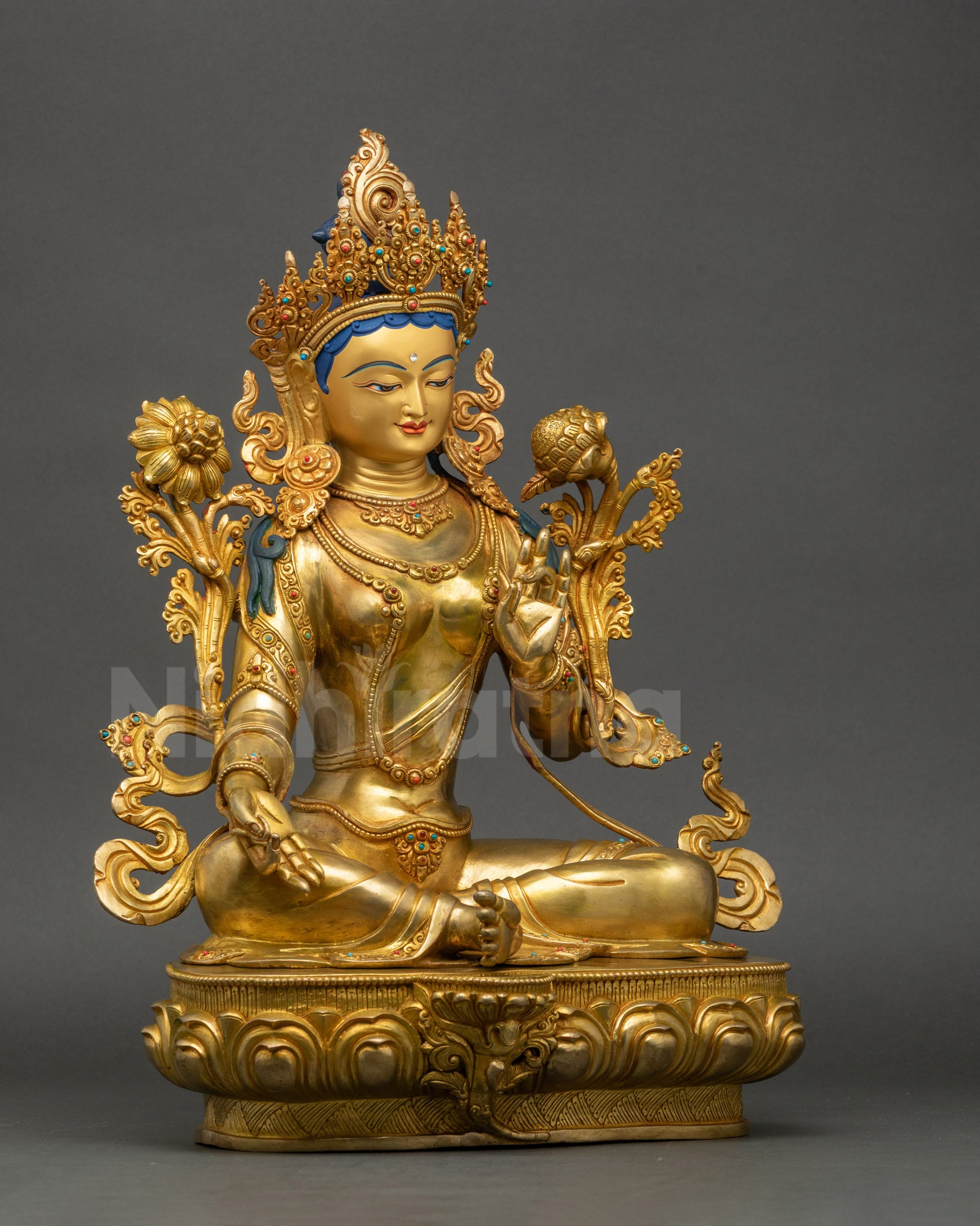 Green Tara Statue right side lotus posture holding utpala flower Nepalese decor