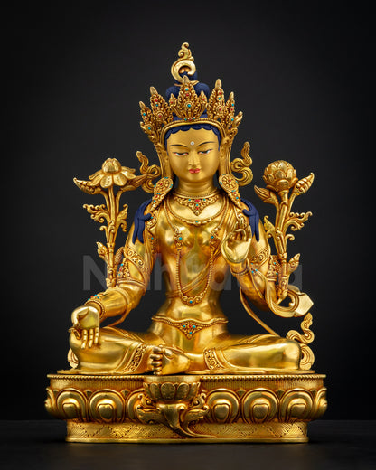 Green Tara Statue seated in Lalitasana on lotus throne holding utpala flowers, handcrafted Nepalese gilded copper artwork