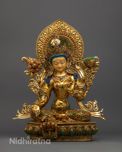 Green Tara Statue seated on lotus with varada mudra and semi-precious stone decoration
