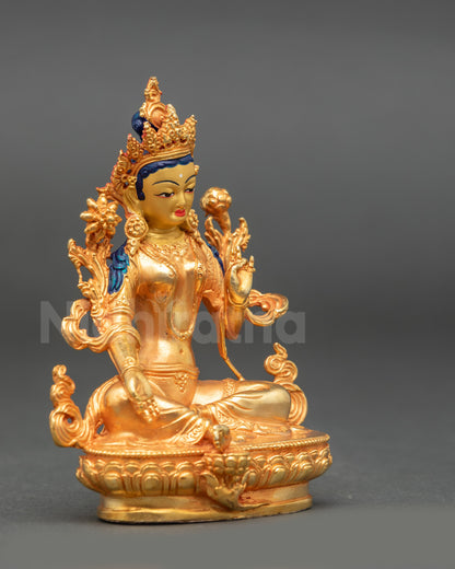 Green Tara Statue side view showing blue lotus stem and gold-gilded copper details