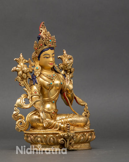 Green Tara goddess right side with ornamental robes and semi-precious stone jewelry