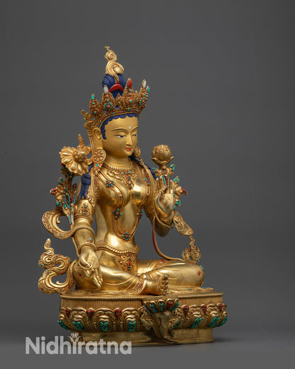 Green Tara right view side with patterned garments and lotus seat jewelry