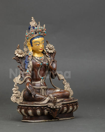 Green Tara seated on lotus throne, Tibetan healing and compassion deity statue