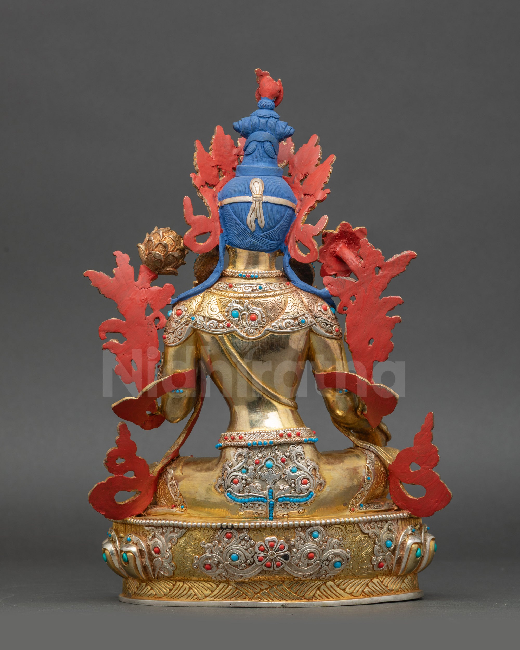 Green Tara statue back view detailed lotus design copper sculpture Nepal