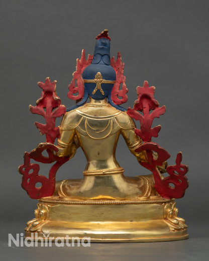 Green Tara statue back view, lotus base and robe patterns carved by artisans