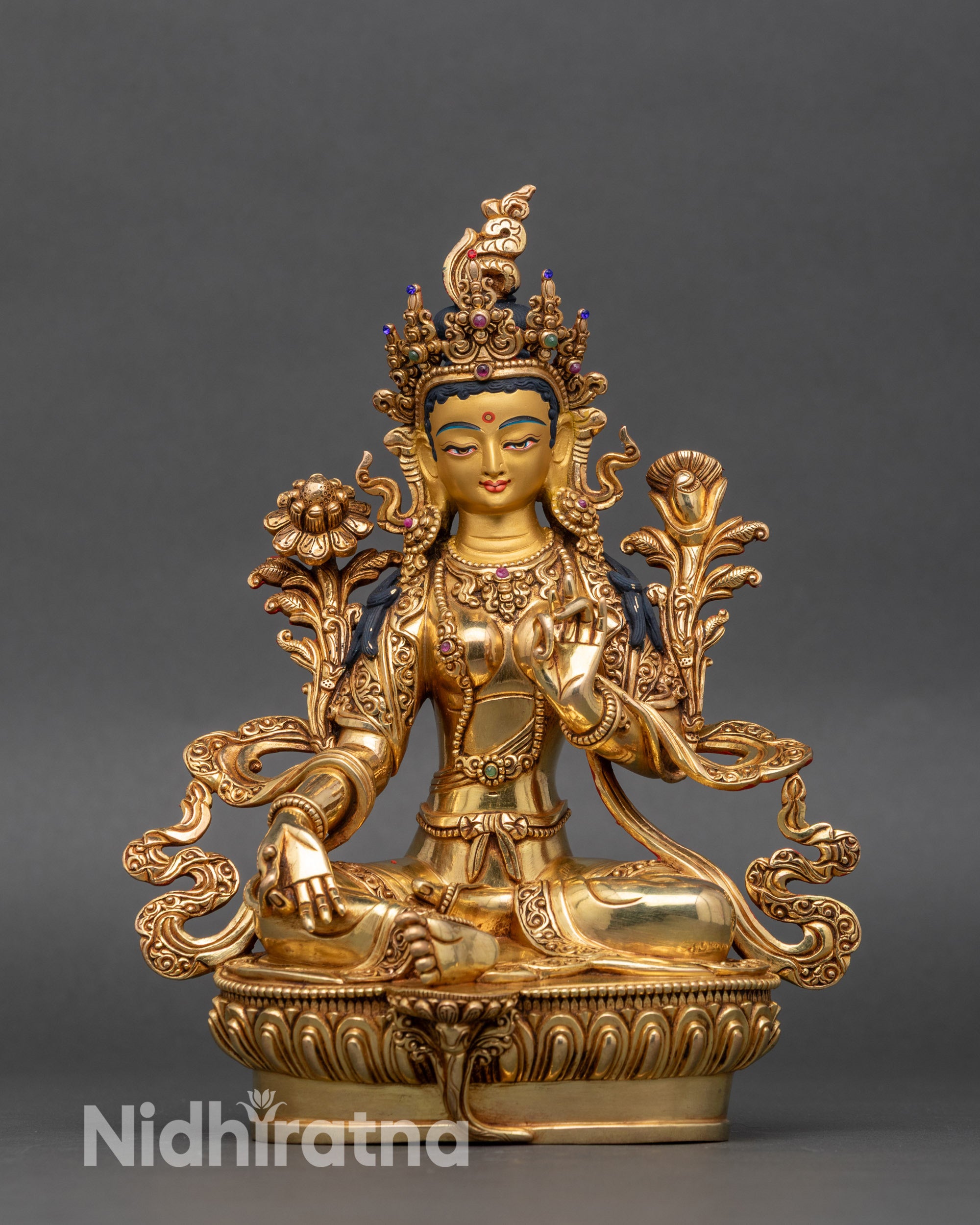 Green Tara statue from Nepal, handcrafted copper with gold-painted face